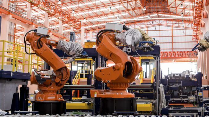 Intelligenza Artificiale e Automazione: Una combinazione vincente per i Processi Industriali - Nella foto bracci robot al lavoro in una industria
